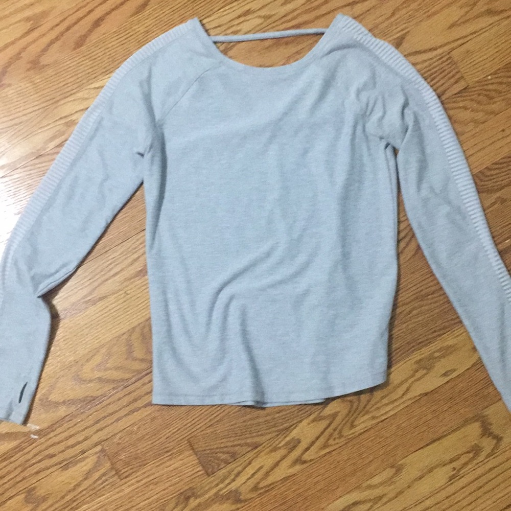 Girls grey long sleeve athletic shirt.